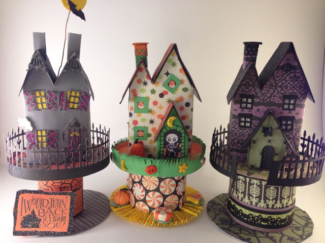 3 early houses on circular base.jpg