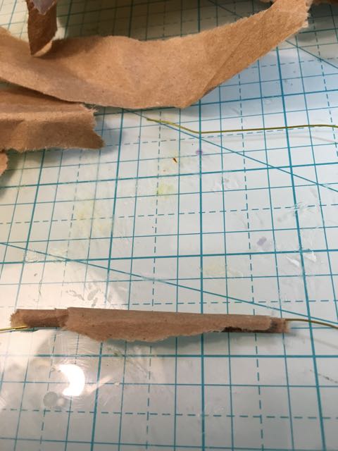 Paper wrapped around the wire.