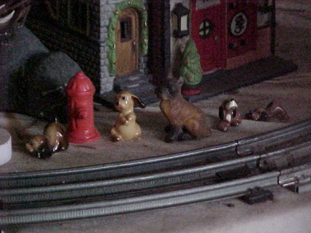 Christmas putz miniature dogs feature