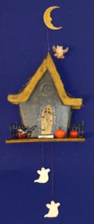 Witch's lair clock moon and ghosts.jpg
