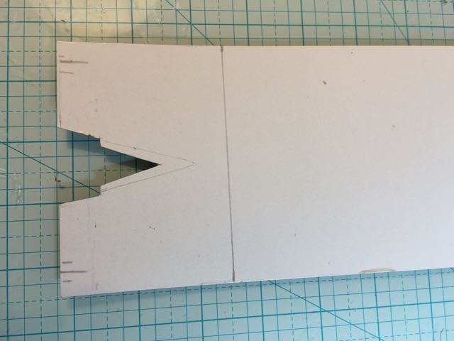Roof cutout for gable, 1/4 inch overhang. Cutout for chimney to be done when chimney fitted to house