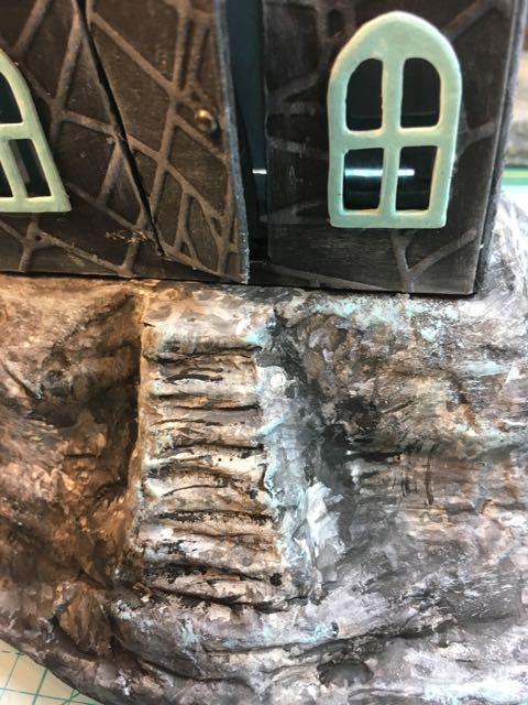 The house on the base, the door barely opens to show the count.