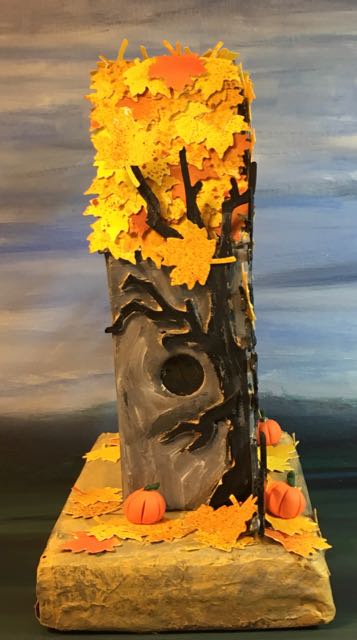 Side view with the leafy shingles