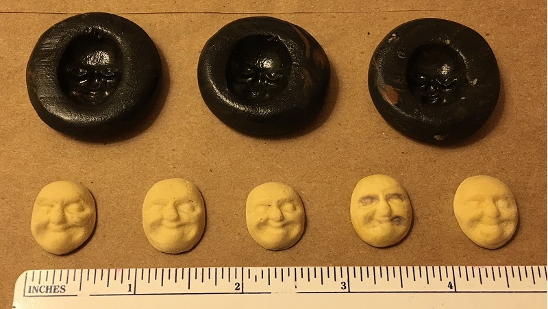 modeling clay push molds and cast faces cleaned up and ready for painting.JPG