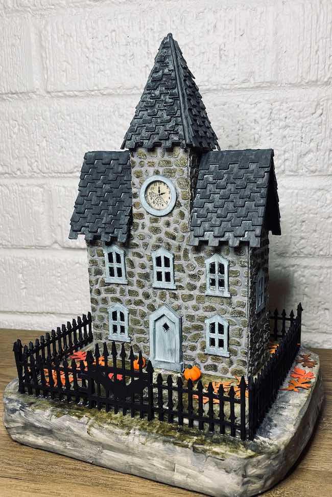 Stone clock paper house front view.jpeg