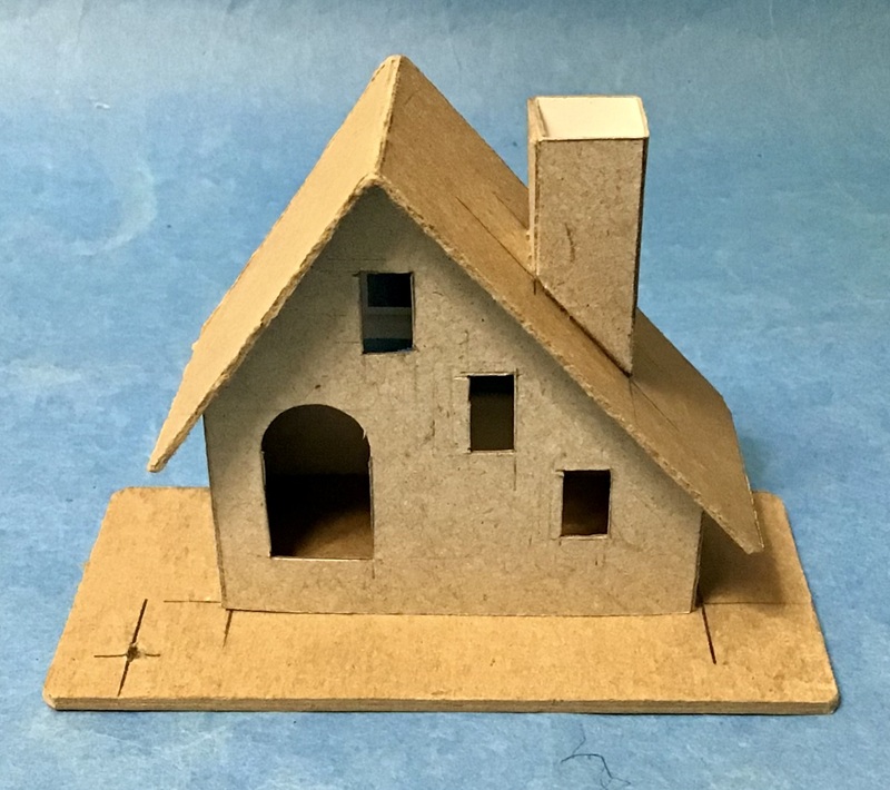storybook house raw cardboard ten cent city.jpg