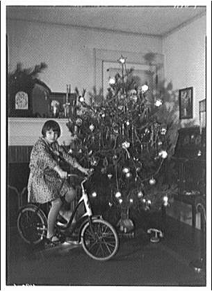 girl with Christmas tree 1930
