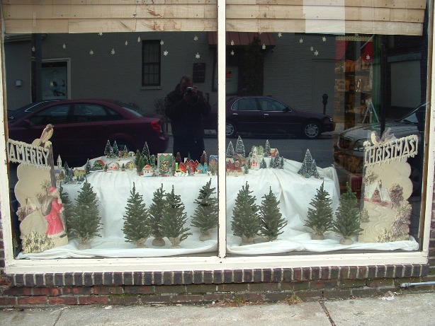 Christmas village store window display